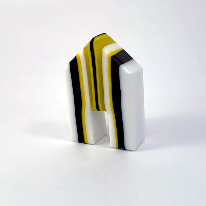Yellow, White, and Black Striped House